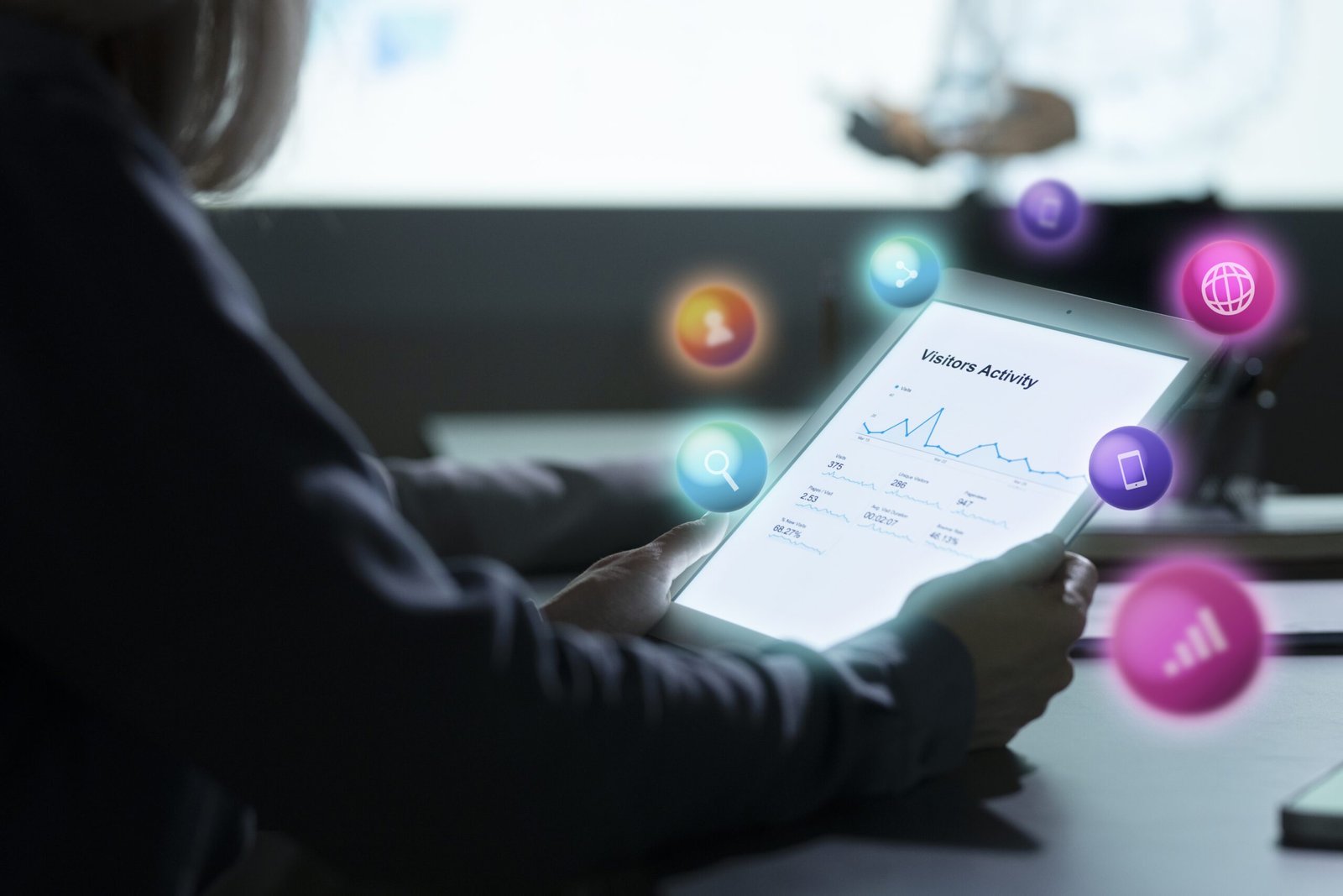 Digital marketing professional analyzing website visitor activity on tablet with social media and SEO icons