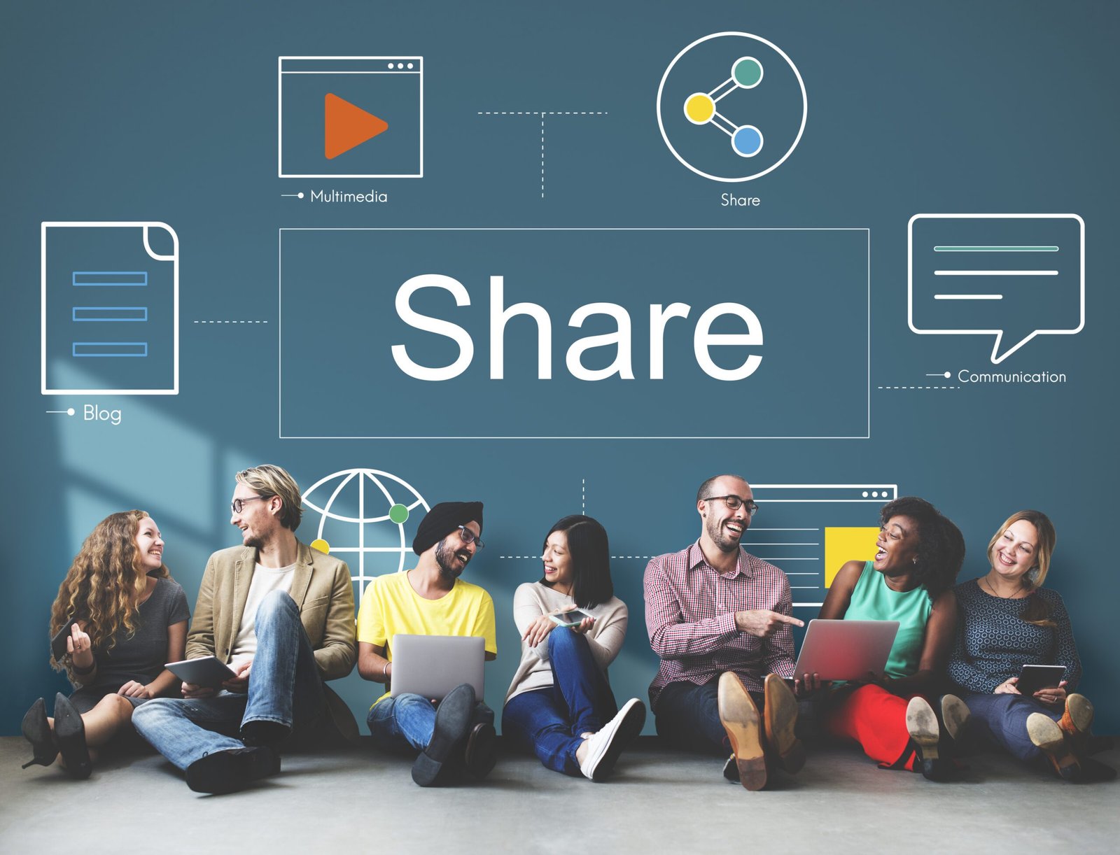Group of diverse professionals collaborating with laptops and tablets under digital communication
