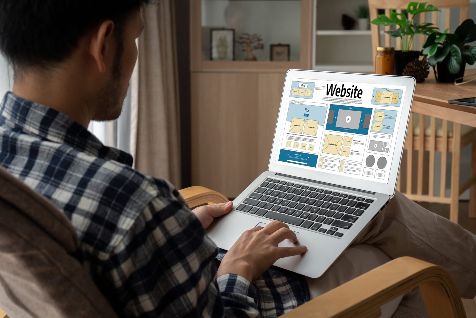 Developer working on responsive Shopify store layout